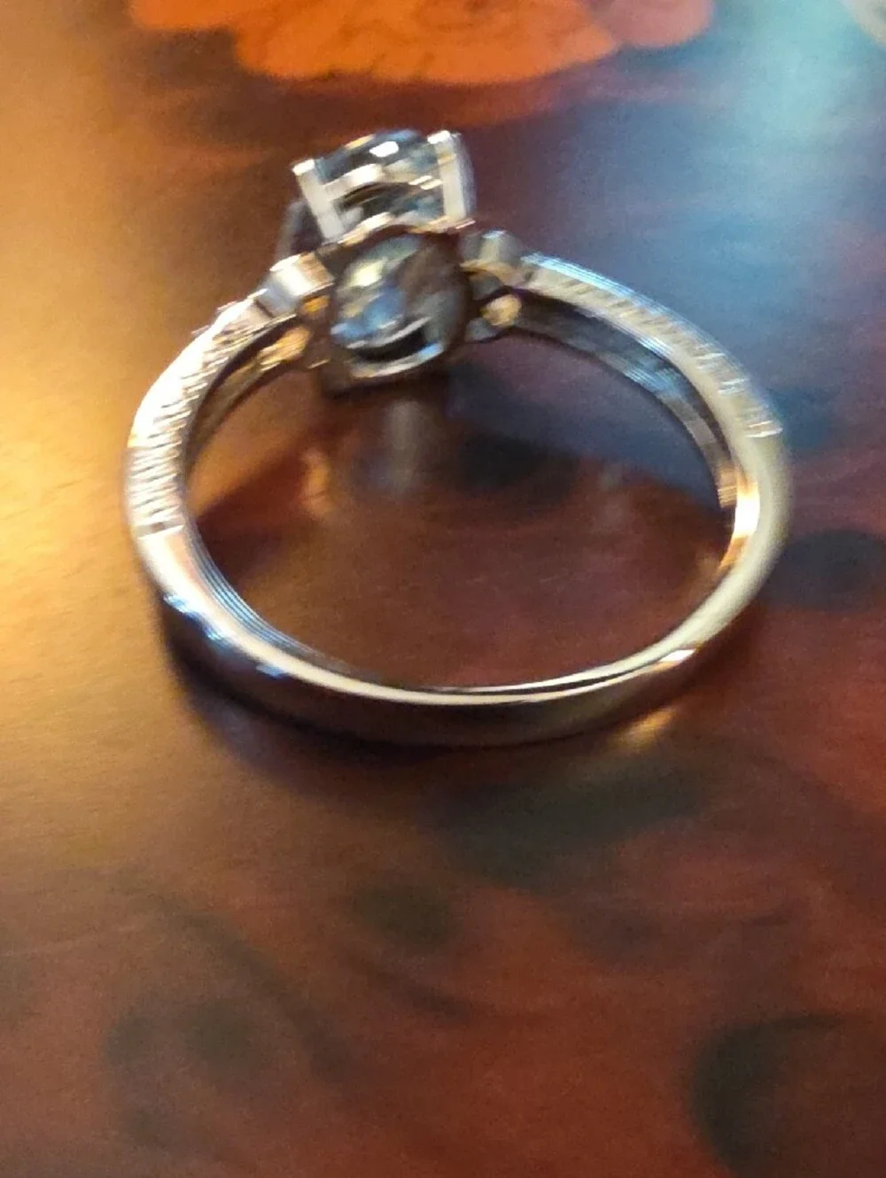 JTV Oval Glacier Topaz(TM) With White Topaz Rhodium Over Silver Ring